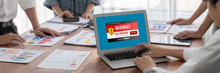 Virus warning alert on computer screen detected brisk cyber threat , hacker, computer virus and malware