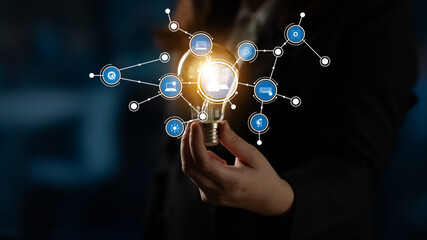 A creative representation of innovation in business featuring a hand holding a light bulb surrounded by digital icons, symbolizing ideas, growth, and technology in a modern context. Tessel