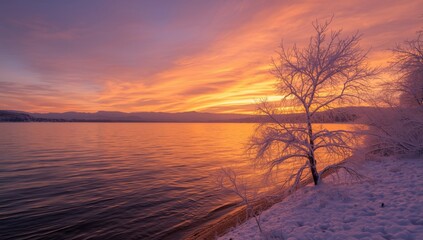 Winter sunrise over a frozen lake, highlighting natural light and seasonal serenity