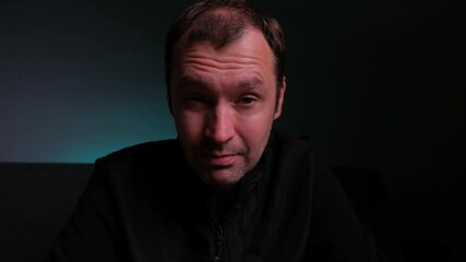 A series of expressive facial reactions showing surprise and deep contemplation, all captured in low light