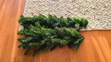 Artificial Christmas Tree Branches on Floor Ready for Storage or Assembly