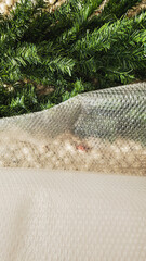 Artificial Christmas Tree Branches and Bubble Wrap Packing for Storage