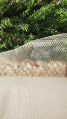Artificial Christmas Tree Branches and Bubble Wrap Packing for Storage