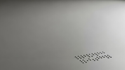 Braille text serving as a meaningful message, symbolizing accessibility and inclusion, set against a minimalist background with copy space for World Braille Day awareness design.