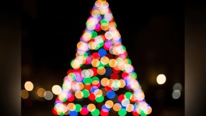 Colorful bokeh lights christmas tree isolated on white background