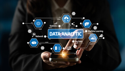 A business professional engages with a smartphone showcasing data analytics concepts, including machine learning and big data in a modern, digital environment. Tessel
