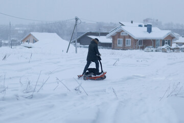 A portable snowmobile for one person to drive on snow.