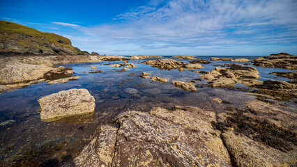 Rocky shoreline at Fraserburgh, Scotland, during low tide