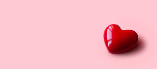 Red Heart on Soft Pink Background: Minimalistic Symbol of Love and Romance
