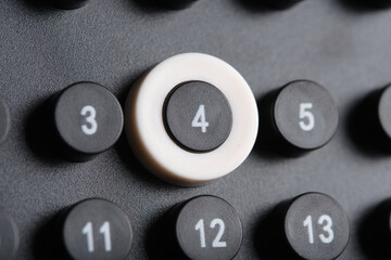 Close up calendar with marked date on 4th.