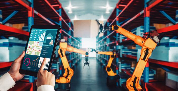 Smart robot arm systems for innovative warehouse and factory digital technology . Automation manufacturing robot controlled by industry engineering using IOT software connected to internet network . - Powered by Adobe