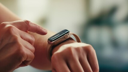 Smart watch using in gym, Close up of woman hands im gym checking incoming notification on smart watch. Incoming text message received on app smartwatch. Social media networking technology concept. - Powered by Adobe