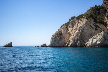 Rock Formation in Ionian Sea during Sunny Summer Day in Zakynthos. Rocky Cliff with Blue Water in Greece. Beautiful Landscape of Greek Island.