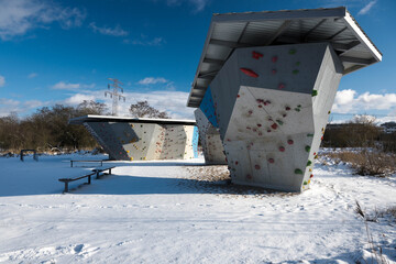 Climbing wall in a winter scenery.
