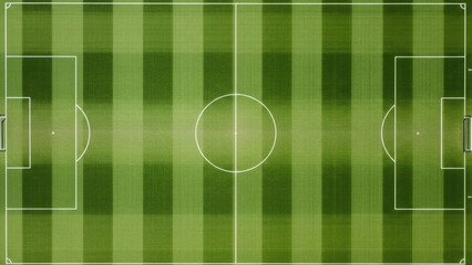 Soccer Field: A pristine soccer field, meticulously manicured with symmetrical lines and lush green grass, awaits the next match, embodying the spirit of sportsmanship and competition.