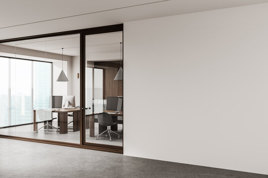 Modern office interior with glass meeting room and blank white wall for advertising or poster mockup display concept in clean corporate space. 3D Rendering