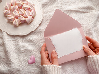 Pink envelope and greeting card. Valentine`s Day aesthetic