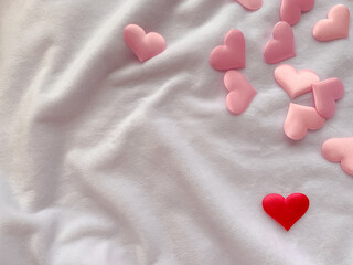 Fototapeta premium Pink hearts on a white background