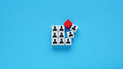 Figures with unexpected red block symbolizing black swan event or sudden disruption.