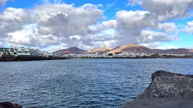 Beach Resort Playa Blanca and Volcanic Mountains, Lanzarote, Canary Islands, Spain
