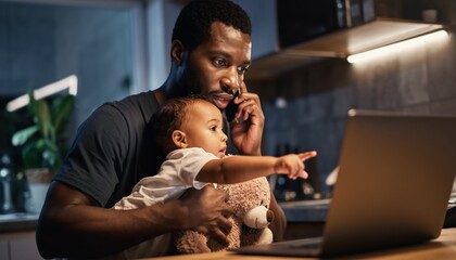 Focused African American father holding his baby while working late on a laptop from home, multitasking on a phone call as the child points at the screen