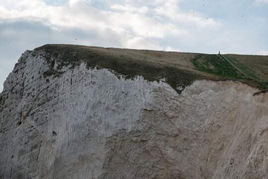 Stunning view of chalk cliffs in England, showcasing natural beauty and scenic landscapes, ideal for eco-tourism and outdoor activities.