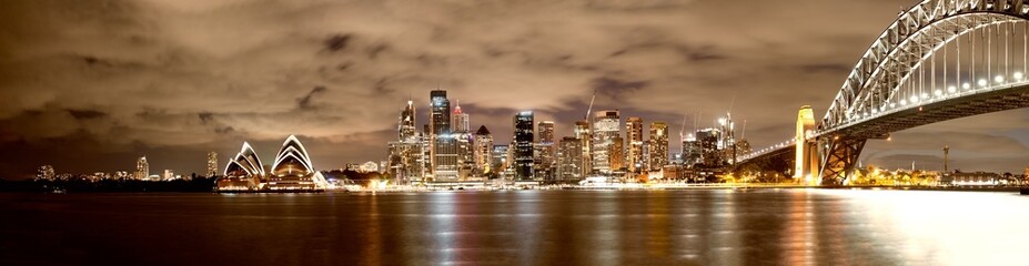 Amazing panoramic night skyline of Sydney Harbour