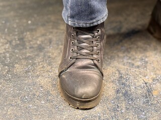 Closeup Of Tough Work Shoes, Highresolution Image Showcasing Aged Industrial Work Boot Details, Indepth Depiction Emphasizing Textured And Worn Features Of Work Safety Footwear