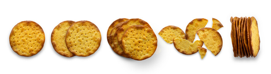 Assorted round crackers shown whole, stacked, and broken, isolated on white background with shadows, illustrating snack variety, texture, and food concepts.