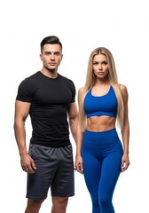 Confident athletic couple showcasing their fit physiques in matching activewear against a crisp white studio background, embodying a healthy and active lifestyle with determination