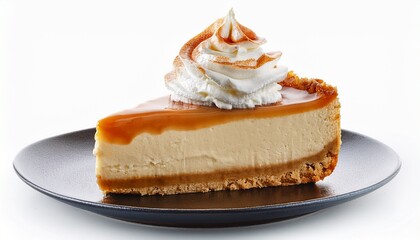 creamy caramel cheesecake slice with whipped topping on white background