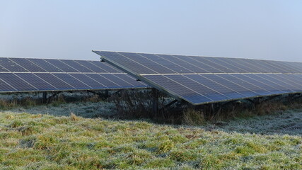 Solar panel farm in the countryside on a winter morning