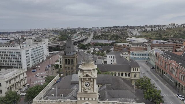 Drone lowers in front of city hall on a cloudy afternoon in Gqeberha, Port Elizabeth, South Africa