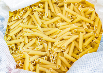 Bulk pasta at a grocery supermarket, dry bulk pasta at a grocery store