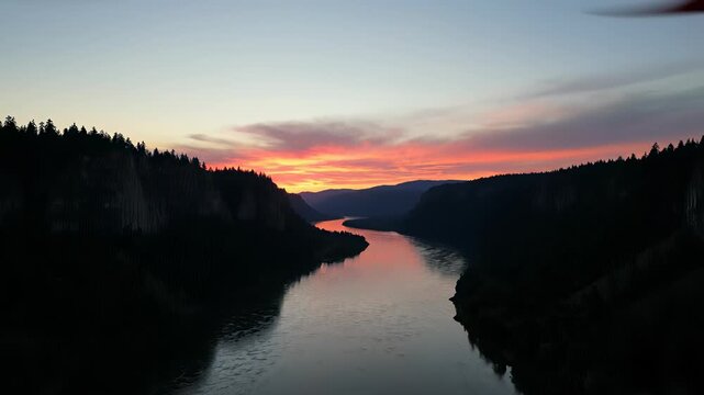 Columbias Gorge River Meanders Through Majestic Landscape at Sunset, Perfect for Adventure and Tranquility Backgrounds or Travel Vlogs.