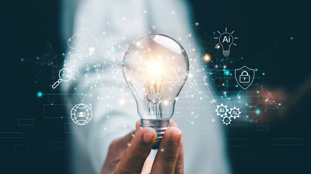 Innovation and creative idea concept, Hand holding glowing light bulb with digital AI icons, cloud computing, data network, cybersecurity. Smart technology and future digital transformation. - Powered by Adobe