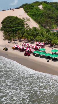 Genipabu Beach In Natal Rio Grande Do Norte Brazil. Bird Eye View Of A Amazing Coastal Beach In The Summer Holiday. Shore Clouds Beach Sea. Seaside Tropical Environment. Natal Rio Grande do Norte.