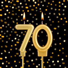 Number 70 on a black background with blurred lights - Birthday card with abstract blurred lights that glow