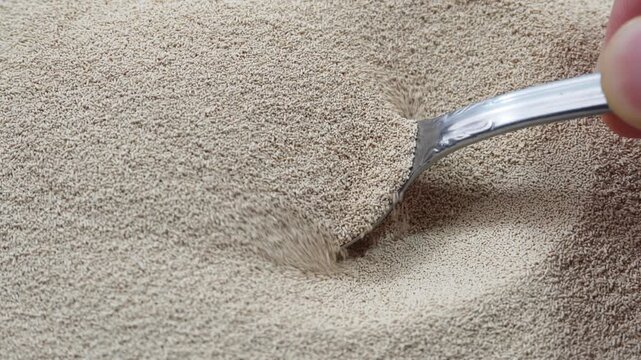 Scooping Instant Yeast with a Tablespoon