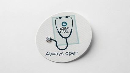 Stylized Stethoscope on Circular Paper with Digital Care Message
