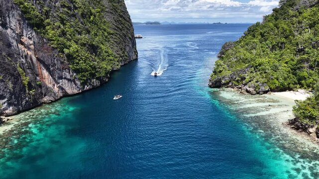 Water flows through a narrow channel in Misool, Raja Ampat. This area harbors spectacular marine biodiversity and is a popular area for diving and snorkeling,