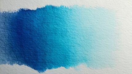 Blue watercolor gradient washes across textured paper