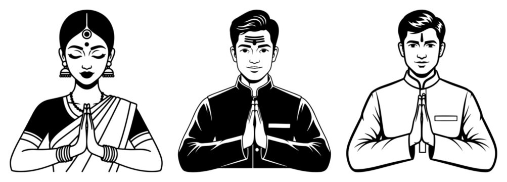 Indian people greeting with namaste hand gesture in traditional clothing