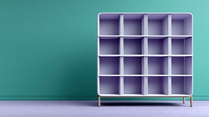 Minimalist storage unit with sixteen empty compartments stands against a vibrant wall