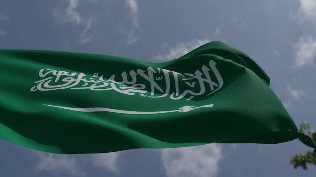 Close- up of the Saudi Arabian national flag waving in the wind. Green field with Shahada and sword in Thuluth script. Saudi national day and Founding Day, Seamless 3d render animation. 4k