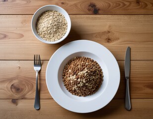 Overhead View of Breakfast Plate and Dog Bowl. Morning Wellness Routine with Pets. A simple healthy human breakfast plate next to a matching full dog food bowl on a clean wooden table.
