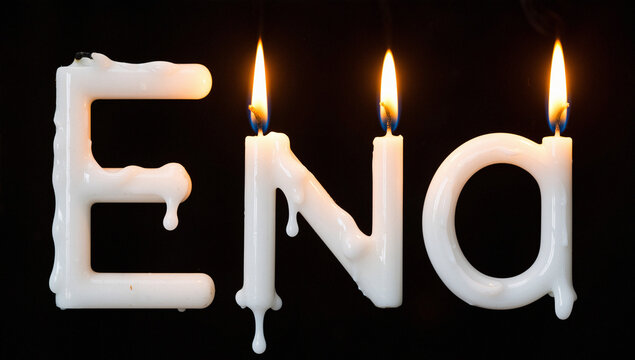 Lit Candles Forming the Word "Ena" on Black Background