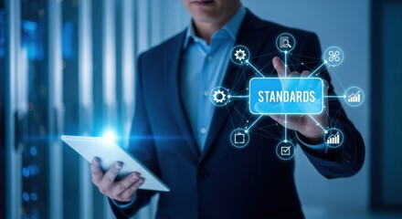 Businessman interacting with digital interface displaying standards, compliance, and regulations in technology and data management environments