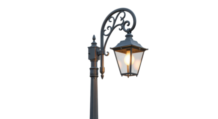 Ornate dark gray metal street lamp with glowing bulb against black light, Isolated On Png Transparent Background