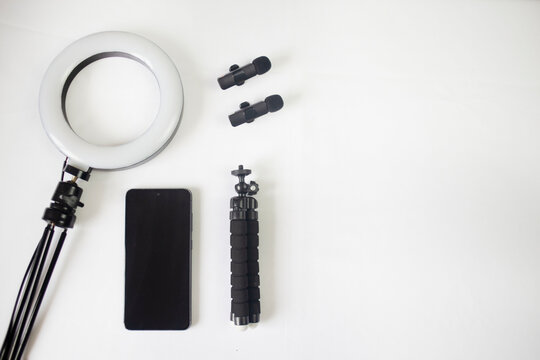 Content creator tools arranged on white background with copy space